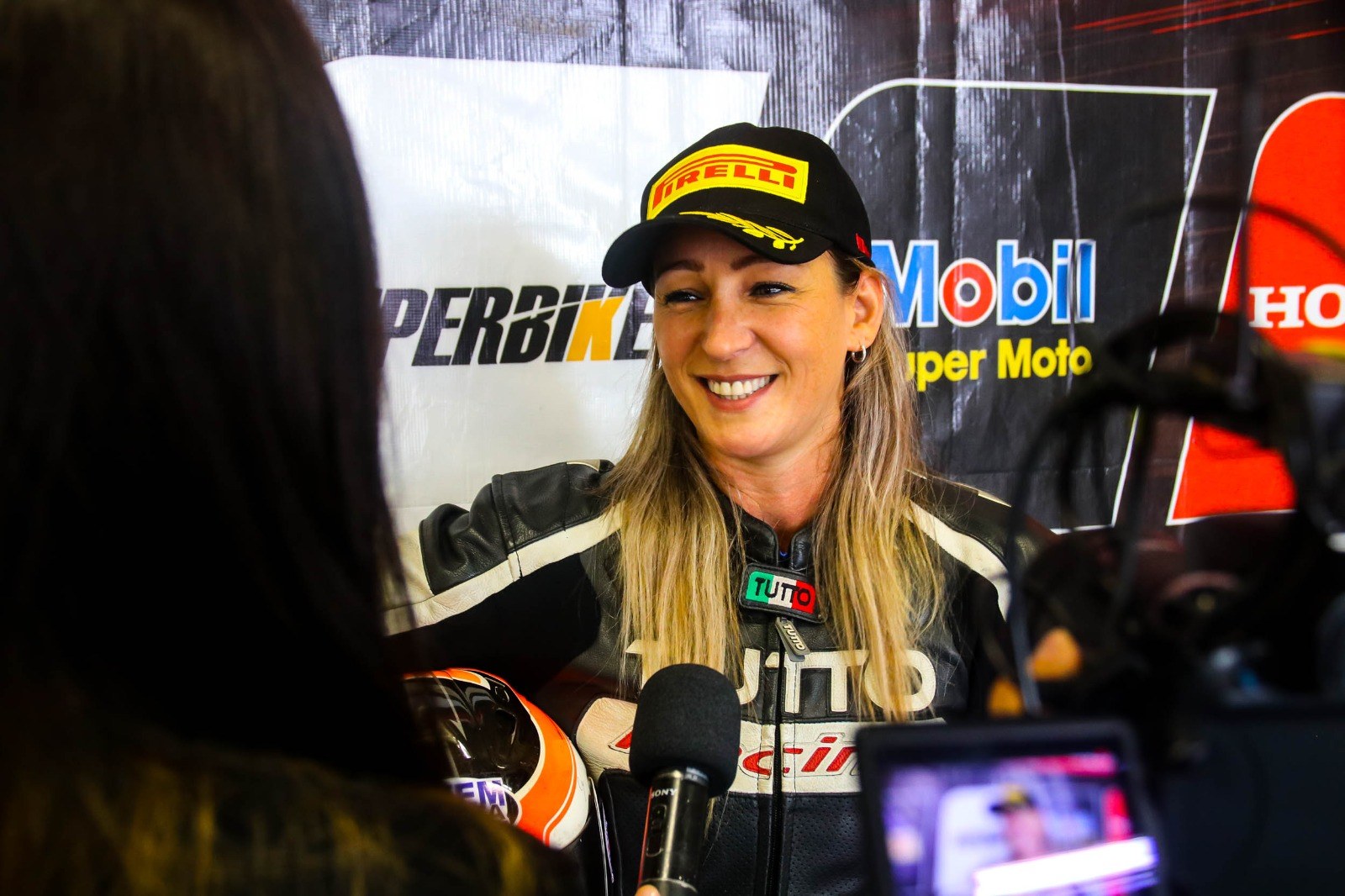 Márcia Reis entrevistada num evento
